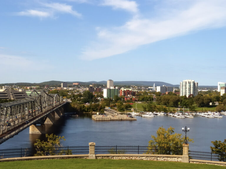 View on the Ottawa river in Canada. Alexandra Bridge between Ottawa and Gatineau on the left.