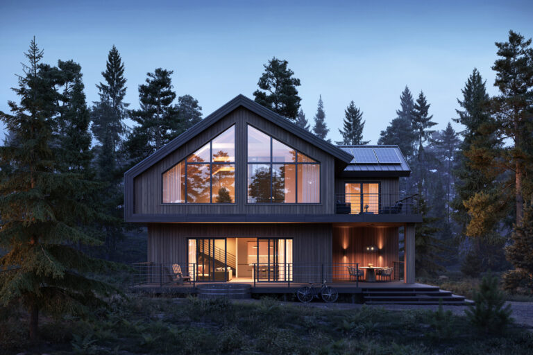 House with large windows and surrounded by trees during night