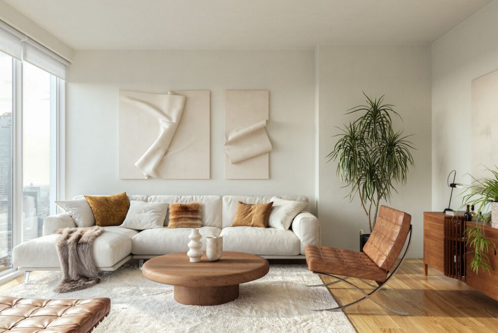 Minimalist living room with a cozy white sofa, beautiful pillows, wooden furniture and modern decor