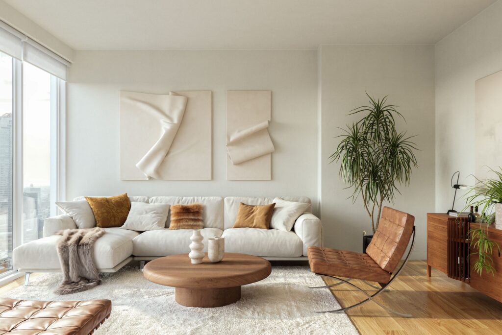 Minimalist living room with a cozy white sofa, beautiful pillows, wooden furniture and modern decor