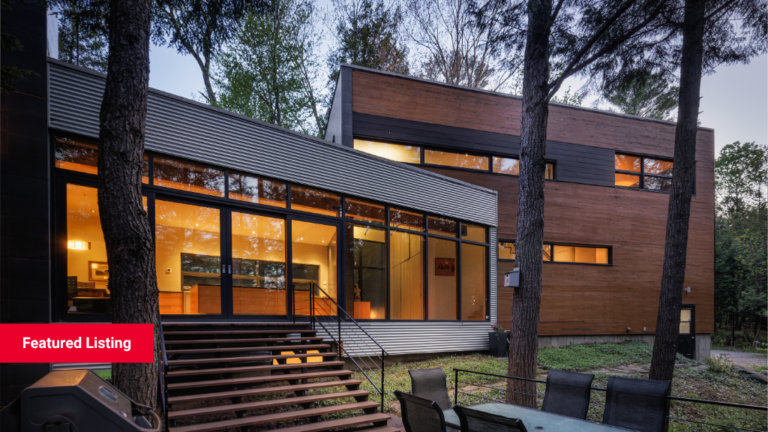 A modern house a dusk in the forest