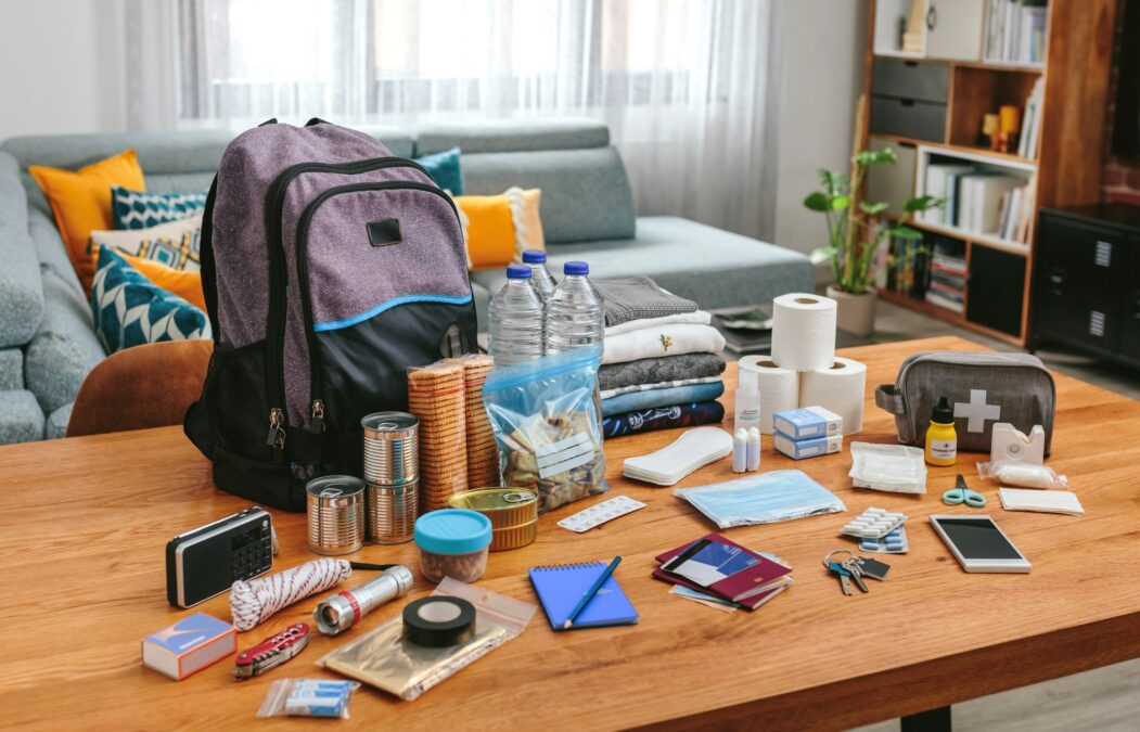 An emergency supply kit on a kitchen table