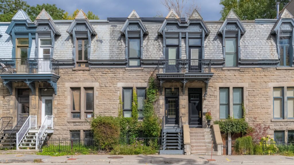 Victorian Quebec townhomes on sunny day